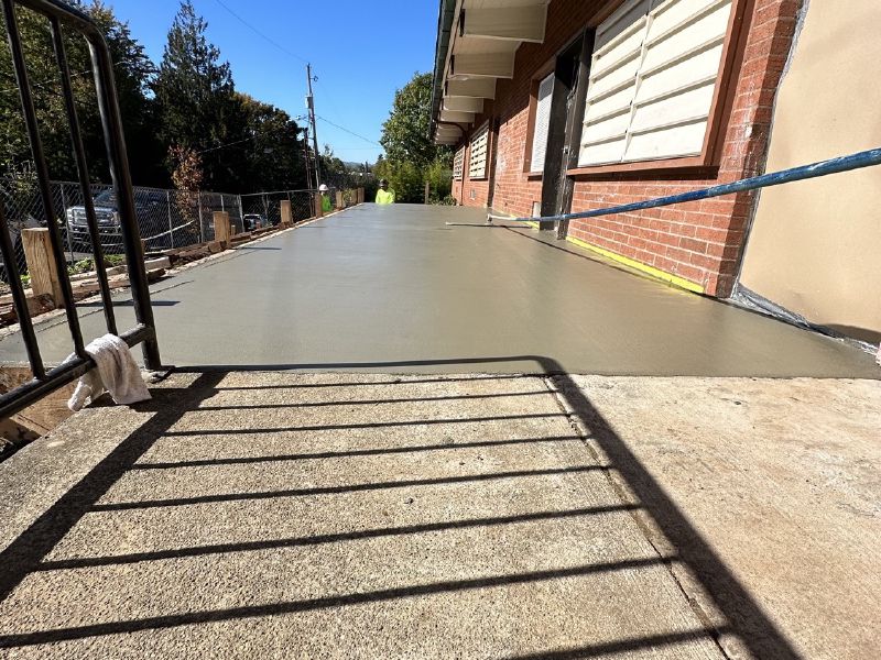 Fresh-poured concrete walkway, screeded and finished